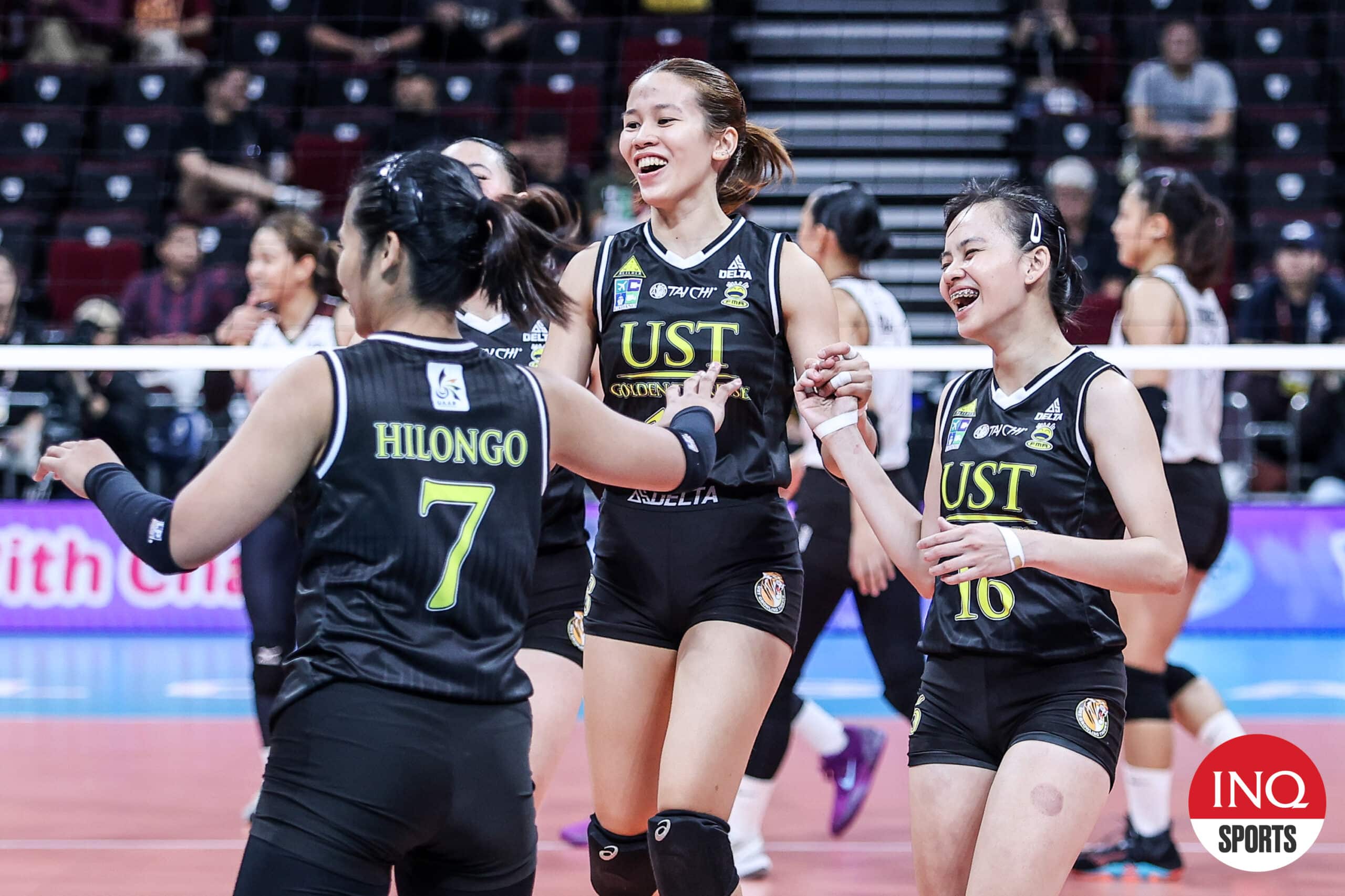 Regine Jurado and Cassie Carballo and the UST Golden Tigresses in the UAAP Season 87 women's volleyball tournament. 