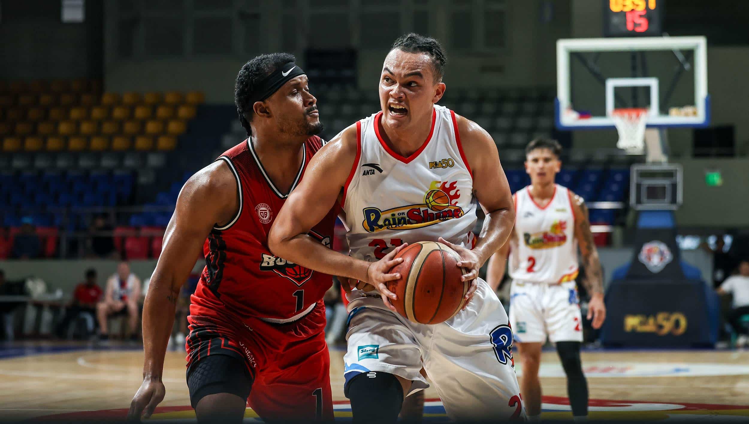 Keith Datu (right) comes up huge for Rain or Shine.
