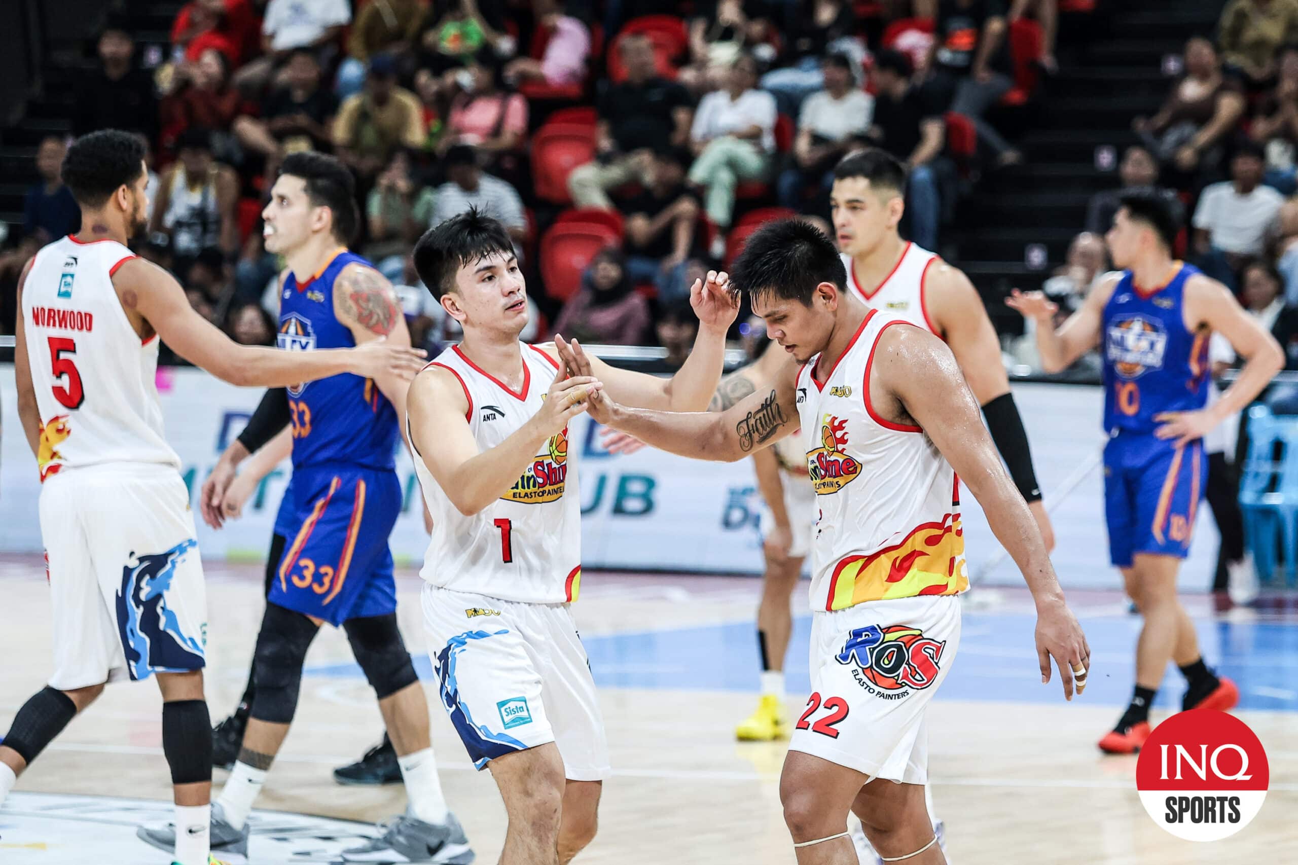 Rain or Shine Elastopainters' Adrian Nocum and Jhonard Clarito during a PBA Philippine Cup quarterfinals game against NLEX Road Warriors. 